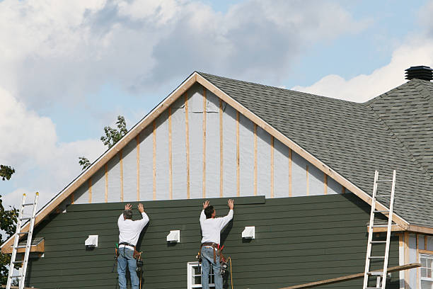 Professional Storm Damage Siding Repair technician working in Ruther Glen, VA